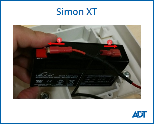 Push connectors into the Simon XT System Battery